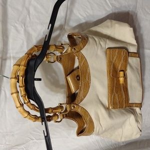 Vintage, women's handbag in canvas with  imitation bamboo straps.
